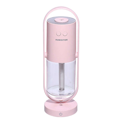 Pink anion humidifier with transparent water tank and controls, ideal for improving air quality.