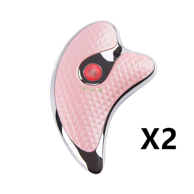 Ultrasonic beauty instrument in pink with dual gear settings, designed for facial treatment and skincare.