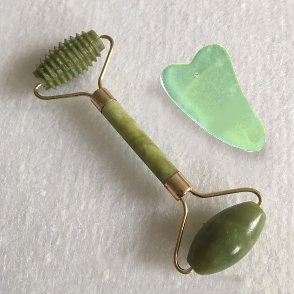 Natural jade beauty container massager set featuring a roller and scraper for skin elasticity and circulation.