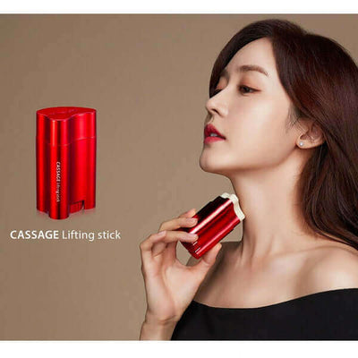 Woman using red Cassage lifting stick for skincare, showcasing beauty and lifting effects.